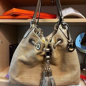 Michael Kors metallic Gold Canvas Leather Drawstring Shoulder Bag